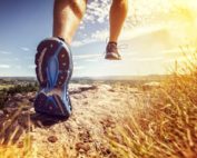 sneakers on a man that is running